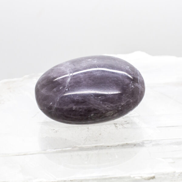 purple anhydrite hand stone