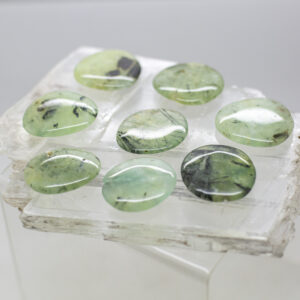 prehnite and epidot hand stone