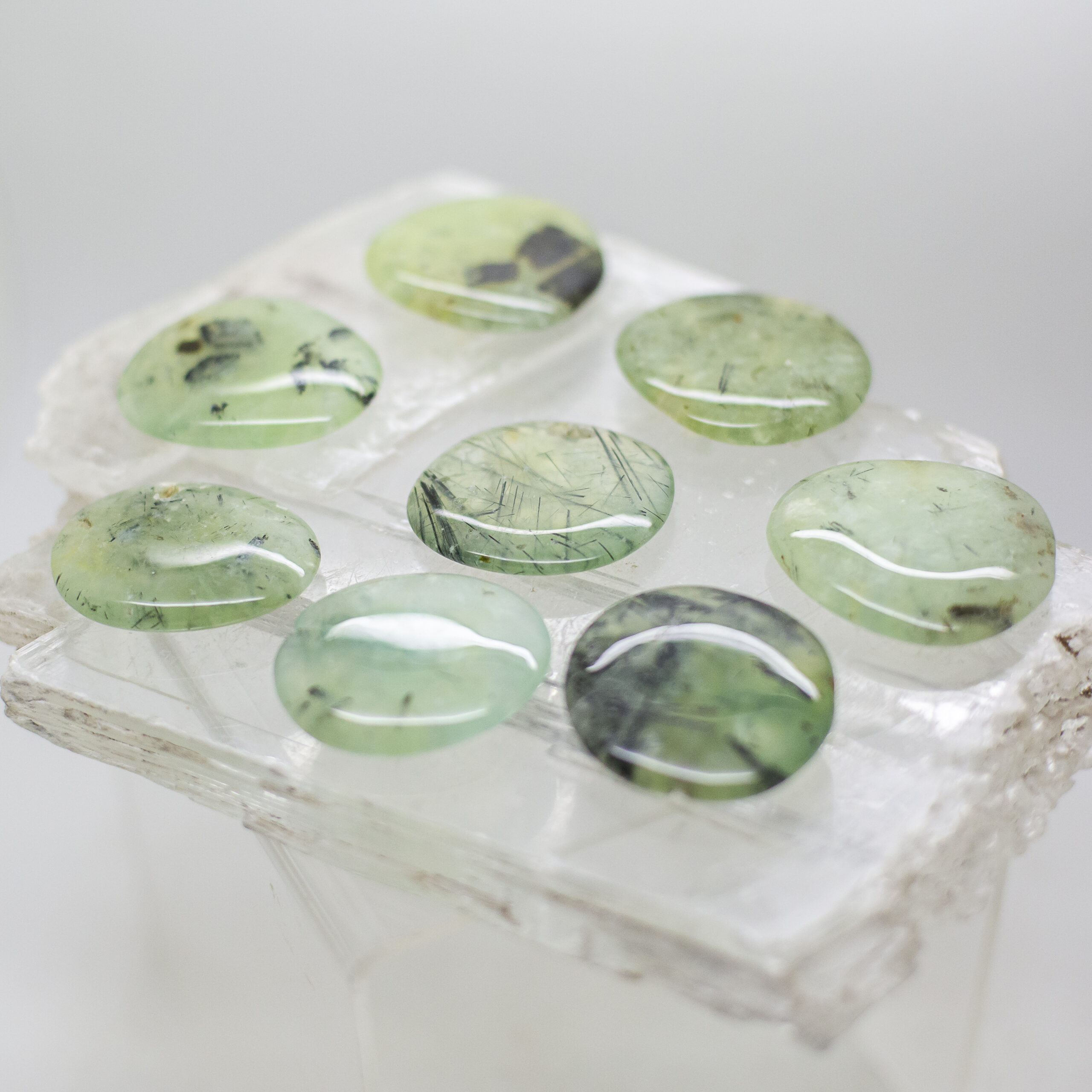 prehnite and epidot hand stone
