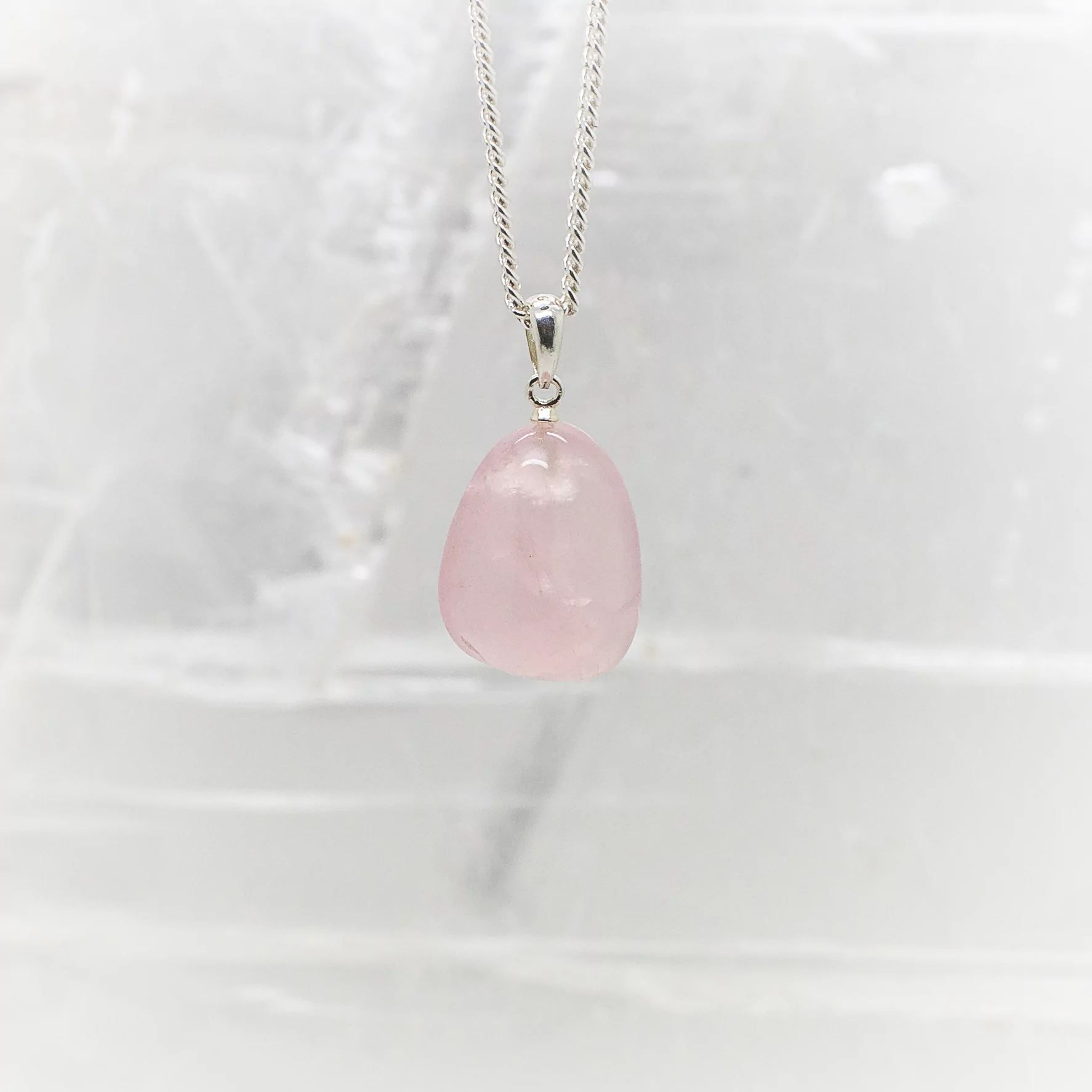 rose quartz tumbled stone pendant